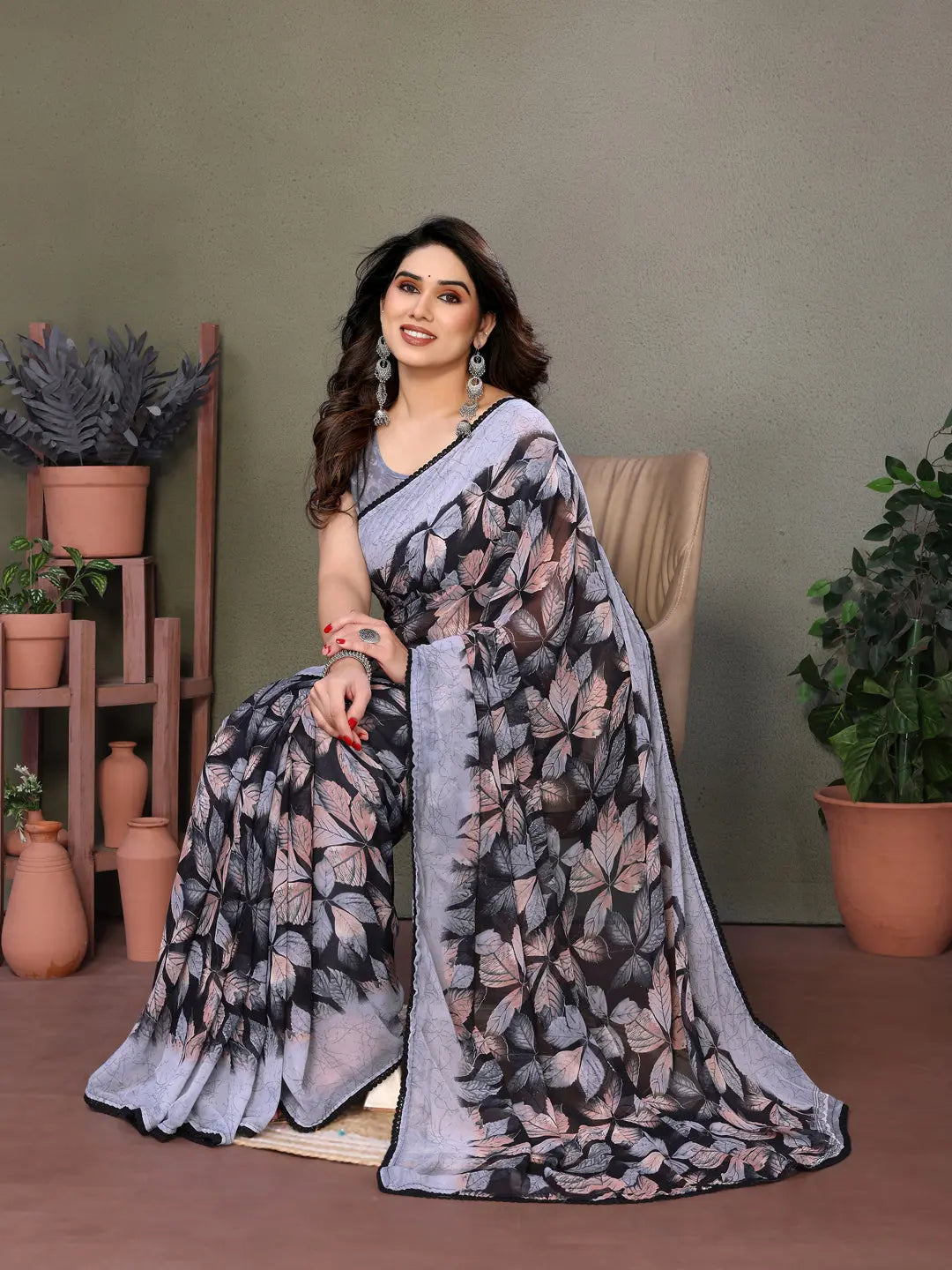 Chic Leaf Print Georgette Saree in Black and Grey PEHRAAVA