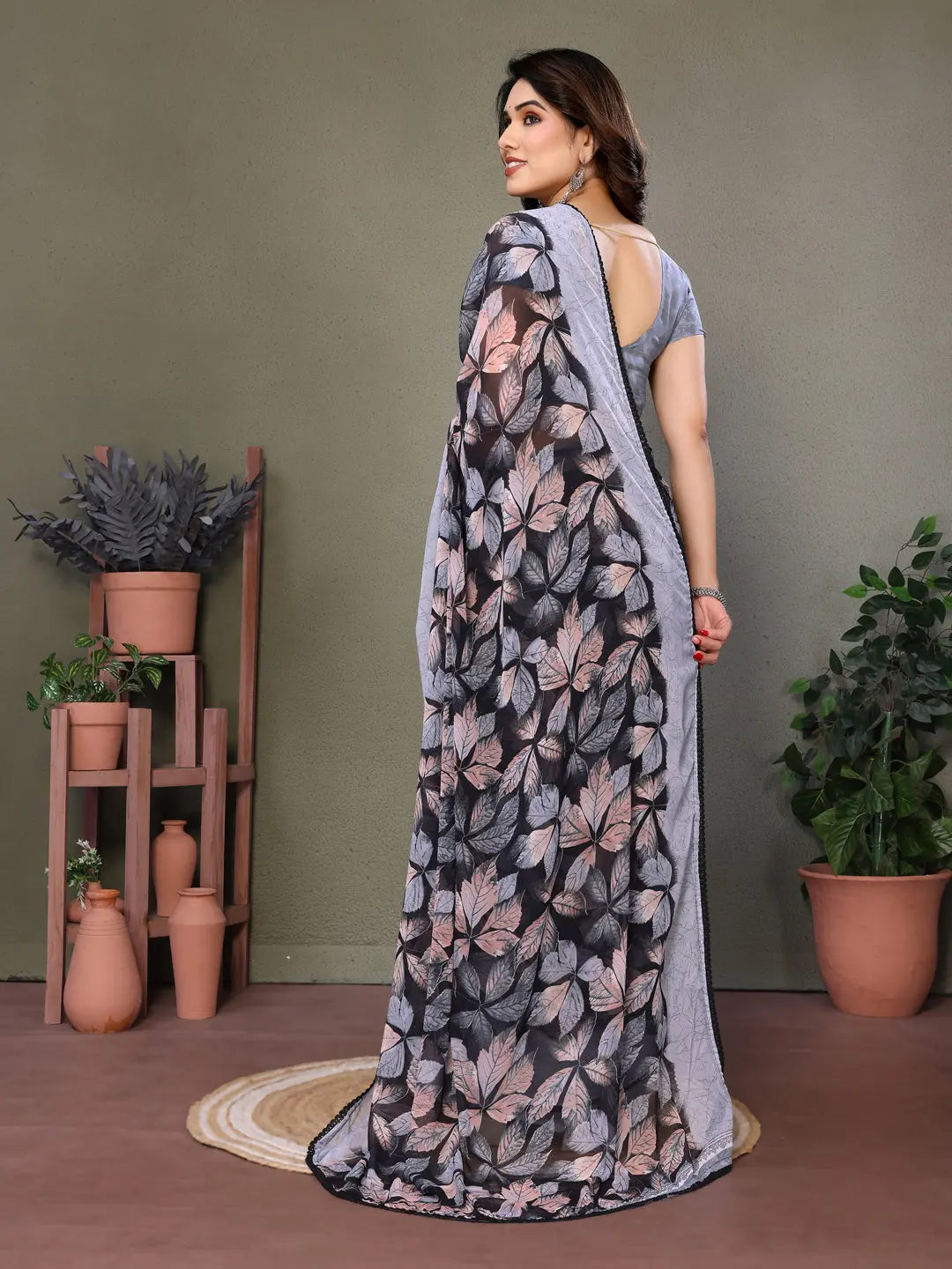 Chic Leaf Print Georgette Saree in Black and Grey PEHRAAVA